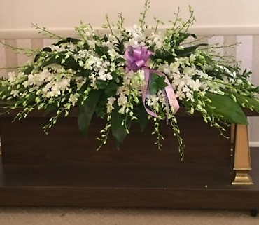 All White Orchid Casket Spray